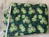 Cotton 100% Patterned - Small green monstera leaves on black background