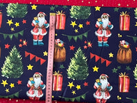 Cotton 100% Christmas - pattern Santa Claus with a bag of gifts on a navy blue back