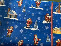 Cotton 100% Christmas - Santas with houses on a blue background
