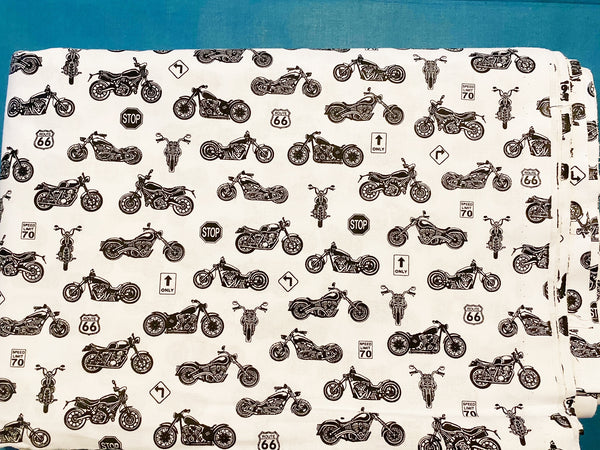 Cotton 100% Kids - small black motorcycles on a white background