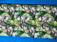 Cotton 100% Patterned - Elephants with greens leaves on a white background