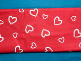 Cotton 100% Patterned - contours hearts white on a red background
