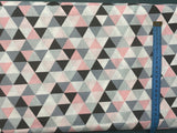 Cotton 100% Patterned - small gray-pink-black triangles on a white background