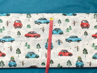 Cotton 100% Patterned - Turquoise-red hunchback cars on a white background