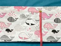 Cotton 100% Kids - Black-pink patterned whales on a white background