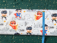 Waterproof Polyester - Superheroes on a light gray background