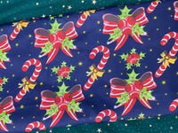 Cotton 100% Christmas - bows and sticks on a navy blue background