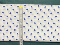 Cotton 100% Patterned - small navy blue hearts on white back