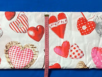 Cotton 100% Patterned - red pendants hearts on white back