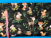 Cotton 100% Kids - Roe-deers and animals with fern leaves on a black back