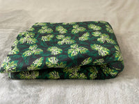 Cotton 100% Patterned - Small green monstera leaves on black background