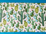 Cotton 100% Kids - green cacti on a white background