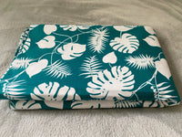 Cotton 100% Patterned -  white leaves on a green background